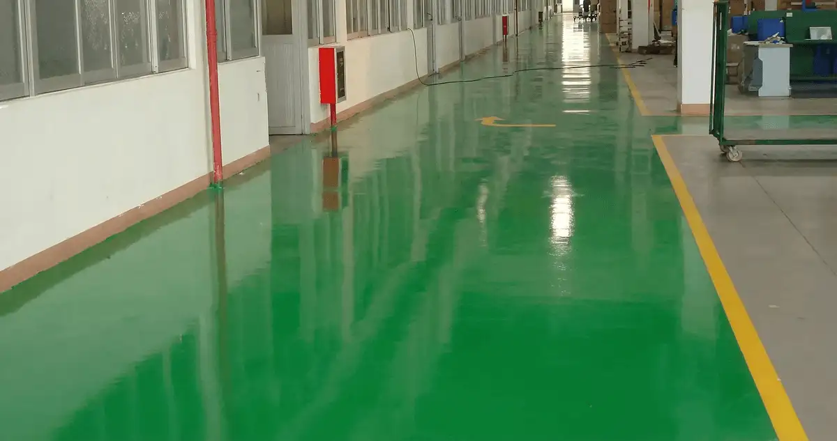 A factory floor professionally covered and marked with epoxy flooring in Cedar Rapids, IA