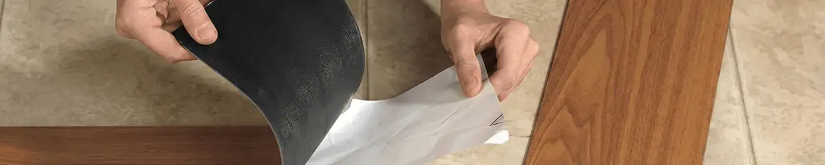 A professional installing vinyl flooring in Cedar Rapids, IA